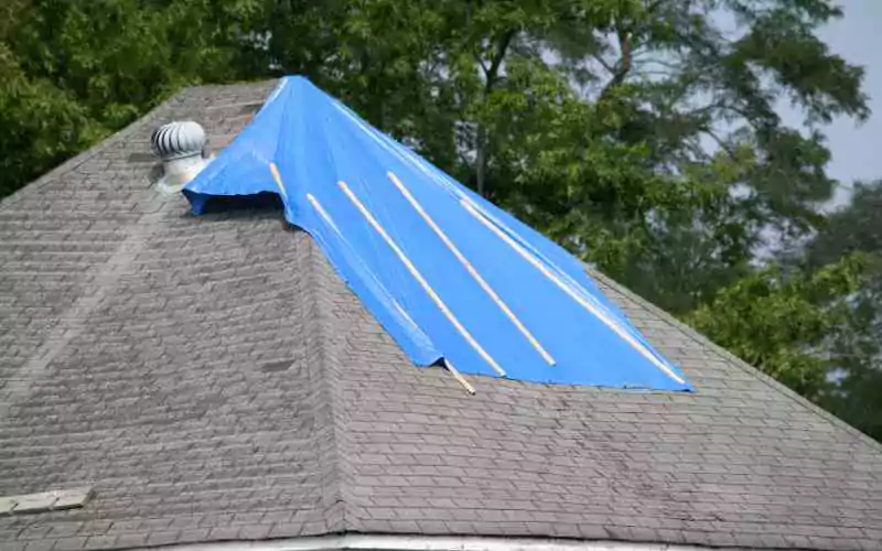 roof-damage-with-tarp