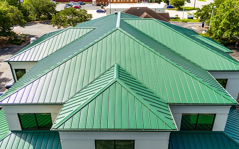 Choufani & Bailey Roofing - new green metal roof installation
