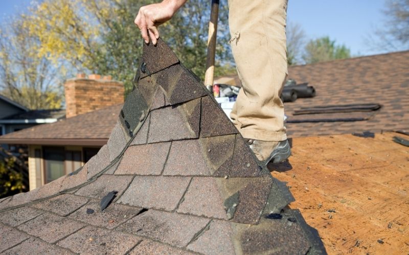 Roof Stripping Stripping shingles off a roof